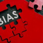 Red brain puzzle with the word bias