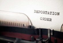 Deportation Order typed on paper.