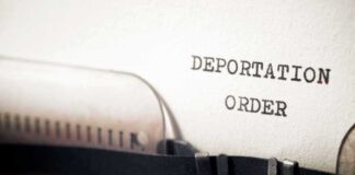 Deportation Order typed on paper.