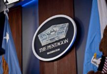 Pentagon Washington emblem with flags in background