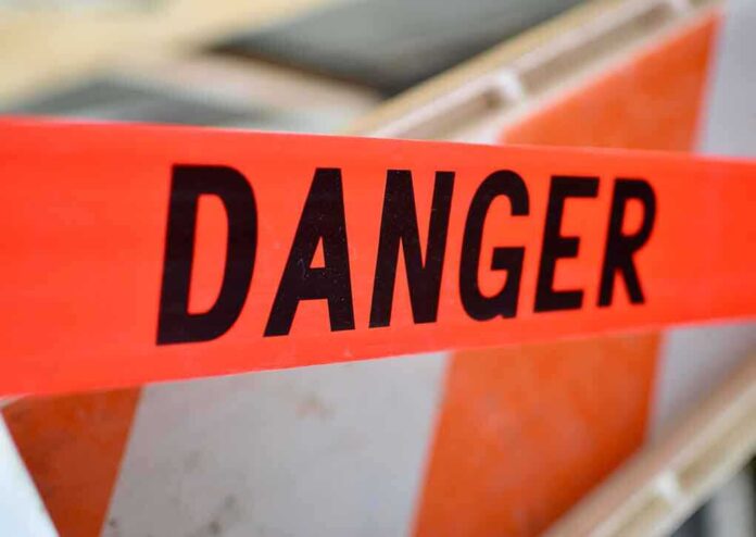 359320793 featured image Red tape with the word danger