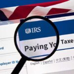 Congress Just Sent the IRS a Message – Loud and Clear Magnifying glass over IRS website paying taxes