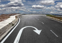 Curved road with a U turn arrow marking