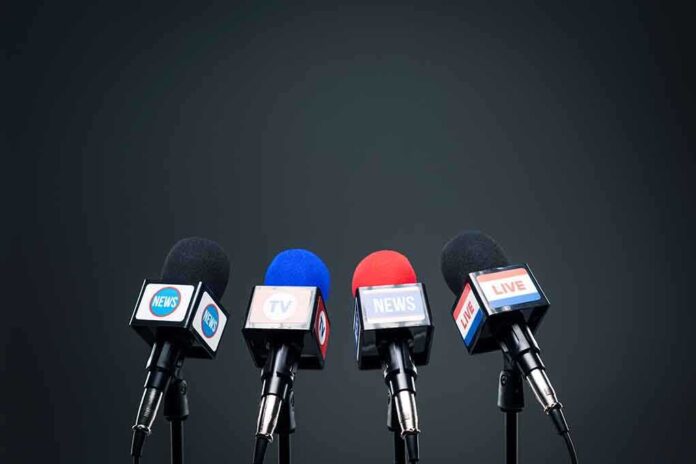 1835618461 featured image Microphones set up for a news conference