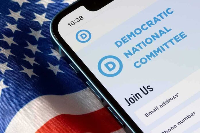 2223653467 featured image Phone displaying Democratic National Committee website over flag
