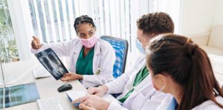 Doctors discussing a chest X-ray image