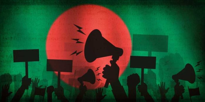 2490035317 featured image Protesters with megaphones and signs on Bangladesh flag