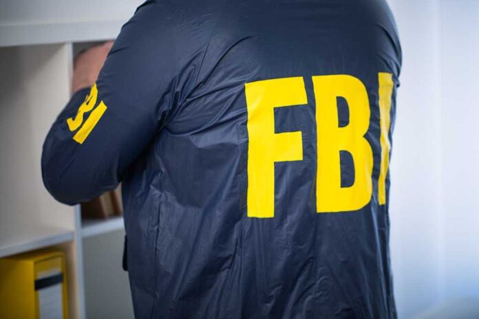 629482703 featured image FBI agent searching shelf in office.