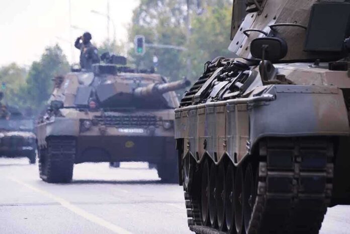 1200057271 featured image Tanks on a road with soldiers inside