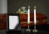 Two candles photo frame and coffin background