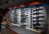Wall display of various rifles in a gun store