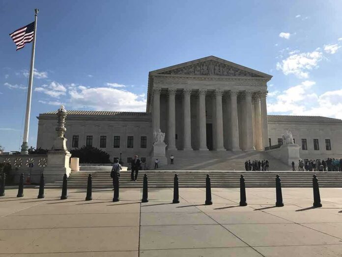 2453289175 featured image Supreme Court building with flag and people outside