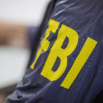 FBI jacket with yellow lettering