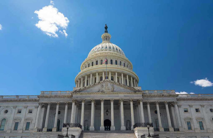 US Capitol building against a clear blue sky