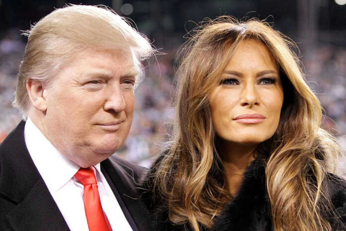Two people posing closely at an event.