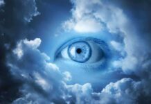 Shocking Illness Clues Lurk in Eyelids A large blue eye emerging from a cloudy sky
