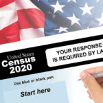 Billions STOLEN From Red States – CENSUS MANIPULATED Hand filling out the U.S. Census 2020 form.