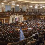 Kennedy Heir WANTS VACANT Congress Seat – Power Grab Large assembly in a government legislative chamber.