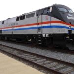 Amtrak locomotive parked at a railway station