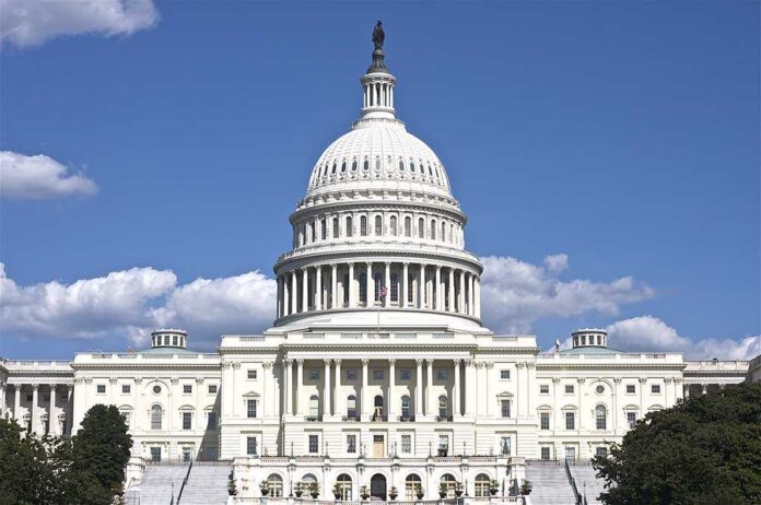 The U.S. Capitol building under a clear blue sky