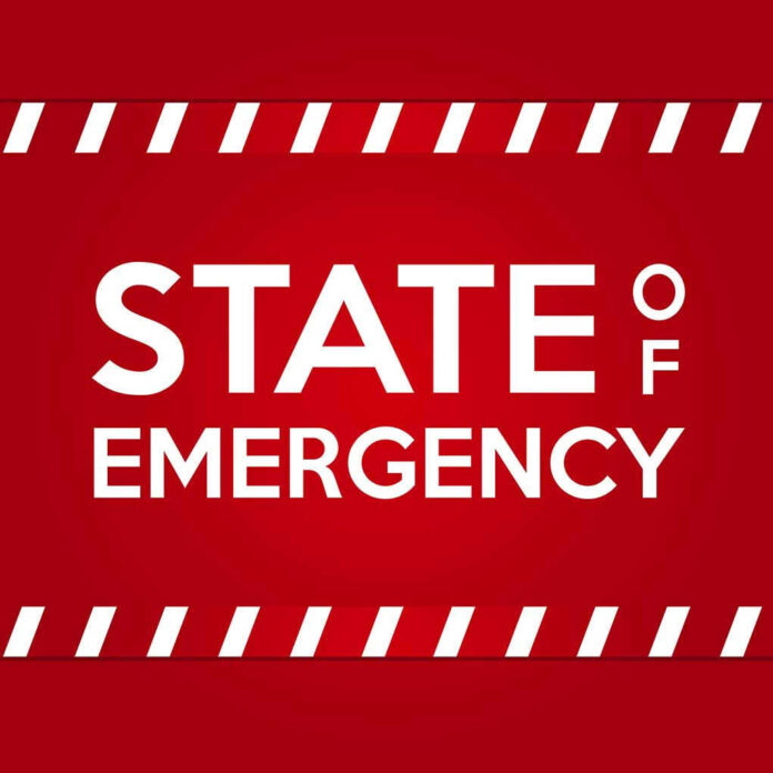 STATE OF EMERGENCY in bold white text on red background.