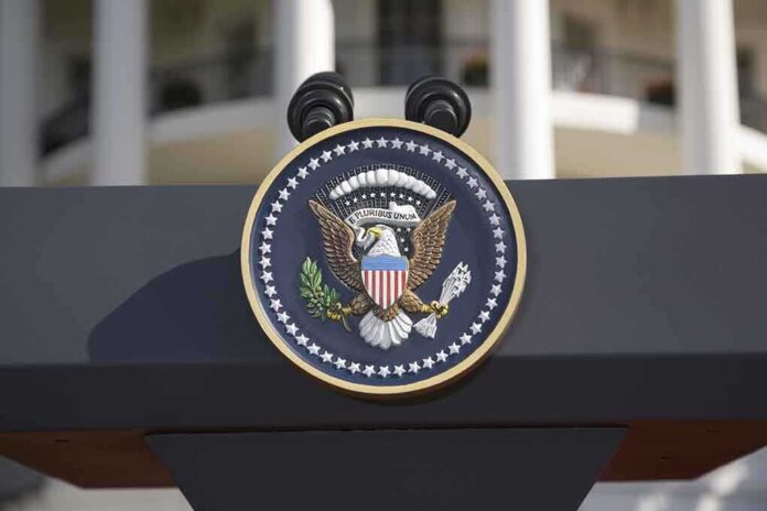 Close-up of the presidential seal on a podium