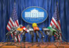 Multiple microphones at White House press briefing podium.