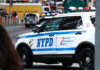 Mamdani Issues Chilling Response to NPD Shooting NYPD police car on a city street scene.