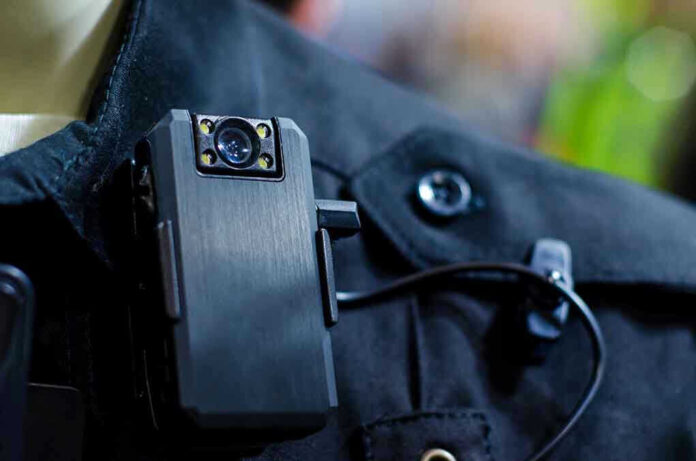Body camera attached to a black uniform.