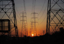 Transmission towers at sunset.