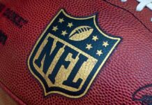 Close-up of an NFL football with the logo prominently displayed