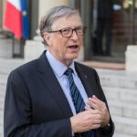 Bill Gates speaking outdoors at an event