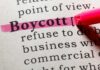 Highlighted definition of the word 'boycott' in a dictionary