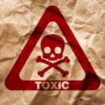 A warning sign featuring a skull and crossbones with the word TOXIC