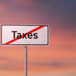 Zero Income Tax? SENATOR Booker Drops Plan Sign with the word Taxes crossed out.