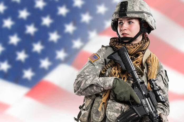 Soldier in uniform with USA flag background.