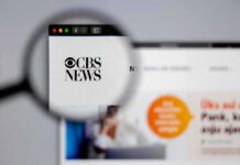 BOMBSHELL: 60 Minutes Caught Rewriting Reality Magnifying glass focusing on CBS News logo on a website
