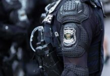 Close-up of a police officer's uniform with a Seattle Police patch