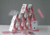 Collapsing house of cards in motion.