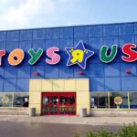 Exterior view of a Toys R Us store with colorful signage