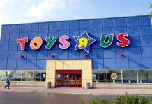 Exterior view of a Toys R Us store with colorful signage