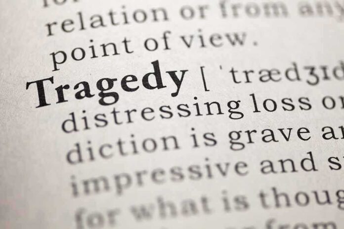 shutterstock_154276778 (3).jpg Close-up of the word 'Tragedy' in a dictionary with its definition