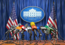 Trump’s Iran Deal TWIST – What’s the CATCH? Multiple microphones at White House press briefing podium.