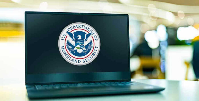 2287986767 Laptop displaying U.S. Department of Homeland Security logo.