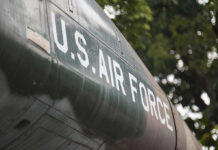 U.S. AIR FORCE Faces CRITICAL MISSING LINK U.S. Air Force plane with trees in background.