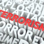 Seven Dismembered Bodies — SHOCKING DISCOVERY The word TERRORISM in bold red letters surrounded by related terms in white