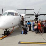 Airline’s SHOCKING Neglect — Dementia Patient’s TRAGIC END Passengers boarding a small aircraft at an airport
