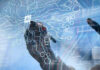 Congress Blocks Chinese Government Robots Hand drawing artificial intelligence digital circuit board.