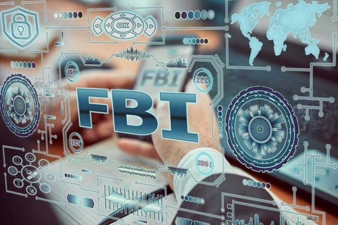 1650133432-1 FBI text surrounded by digital security graphics and hands