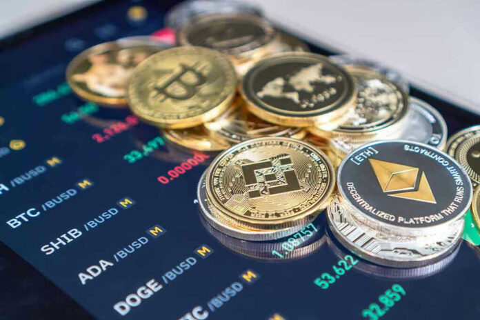 2002007354 Cryptocurrency coins on a trading screen background.